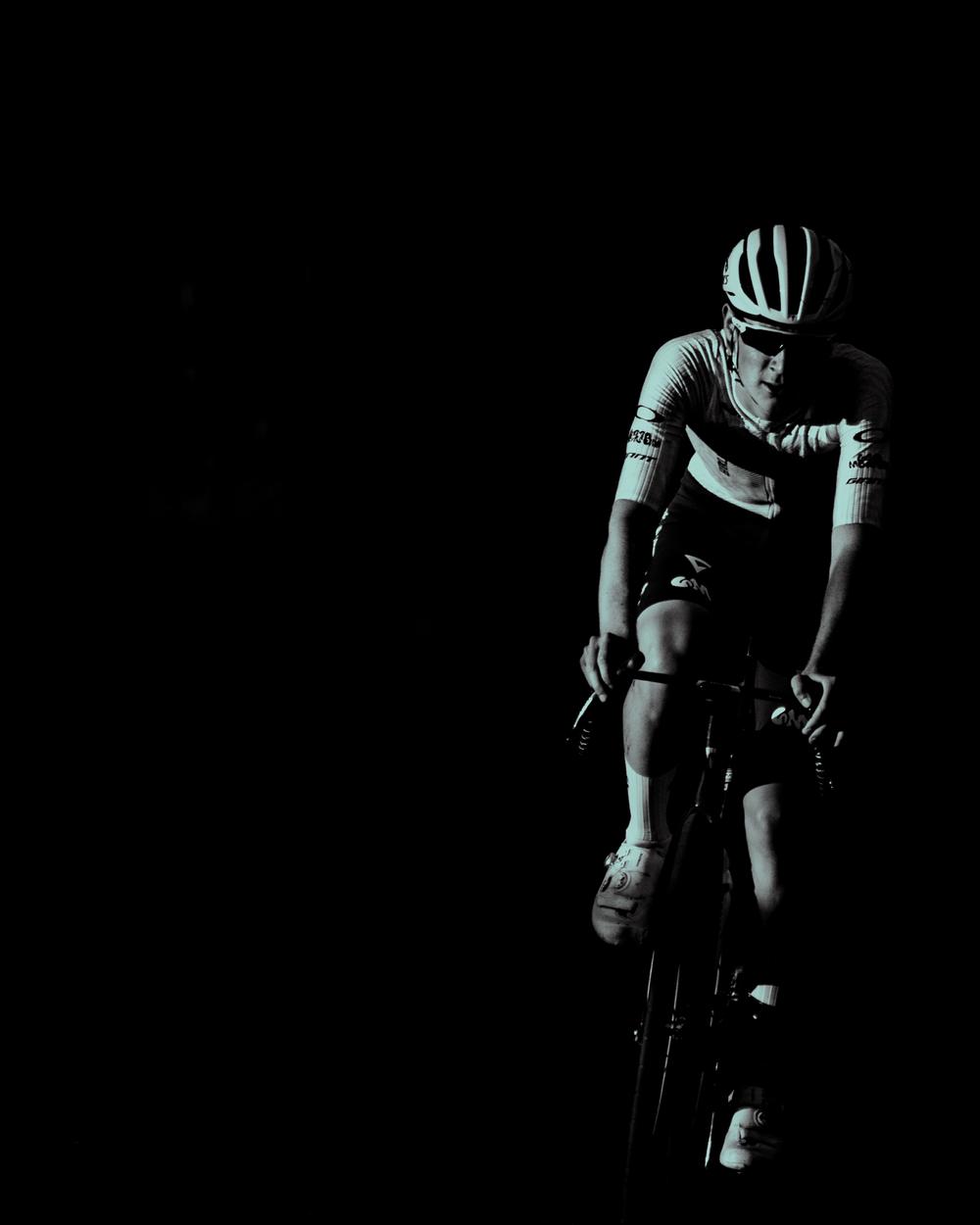 NSTRMO rider lit against the dark