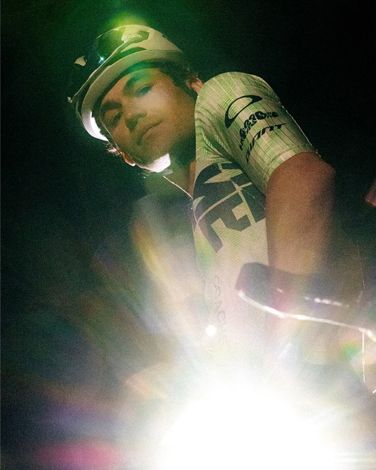 NSTRMO rider at night in green light