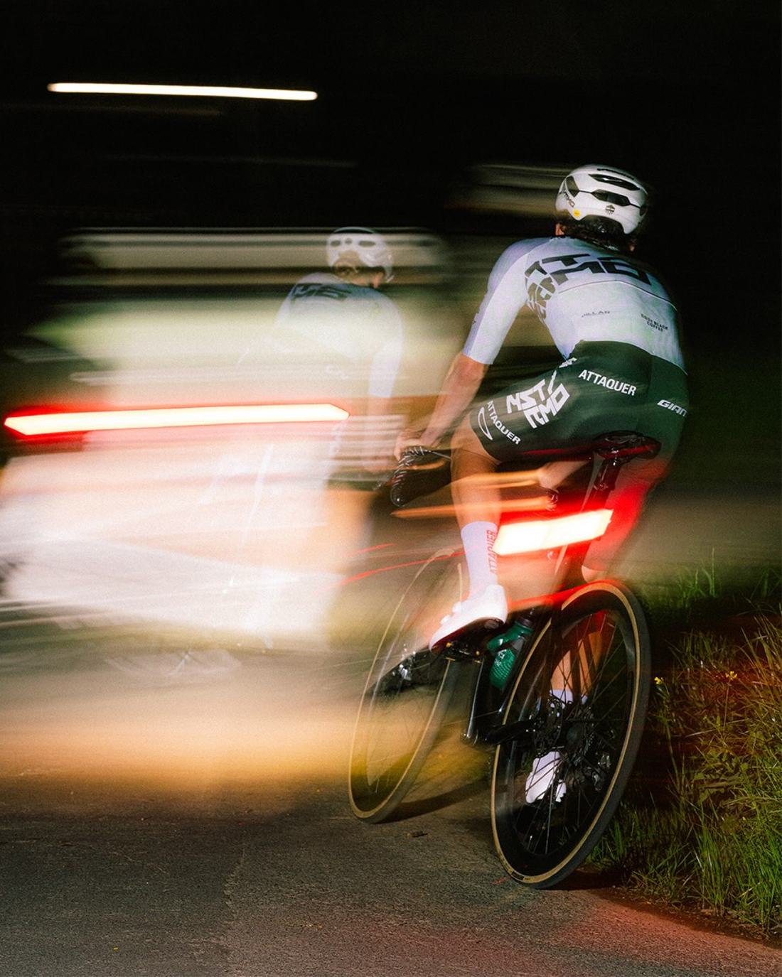 NSTRMO riders at night, lit by Knog lights