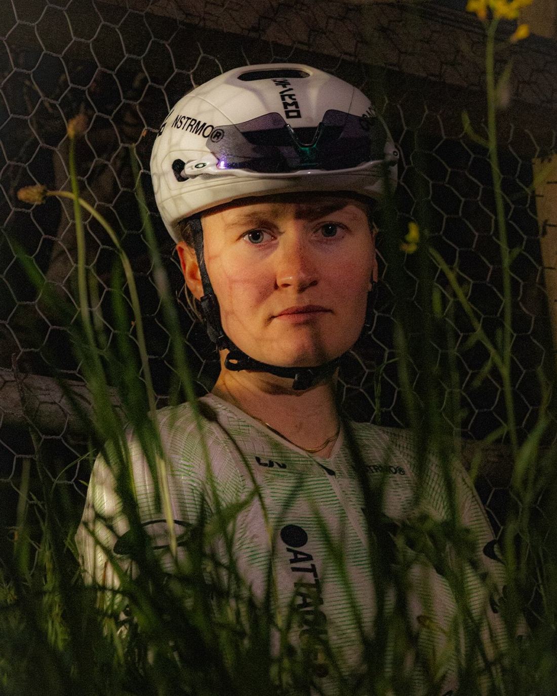 NSTRMO rider in team kit at night