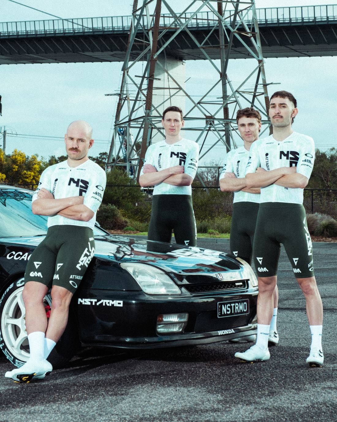 Four NSTRMO riders in front of the team car
