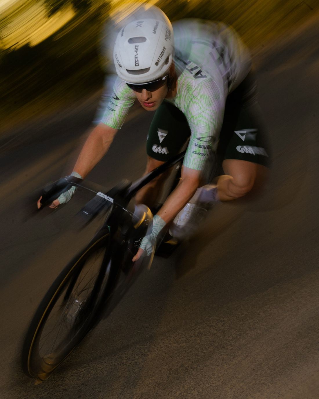 NSTRMO rider cornering in low light